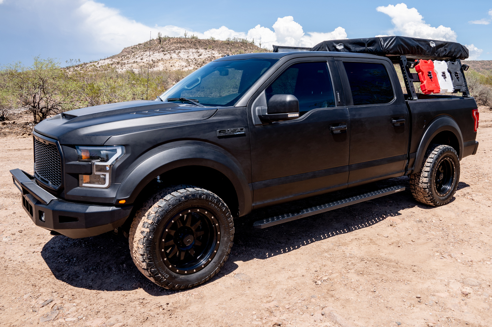 Raptor Series Sawtooth Slide Track Running Boards on a truck